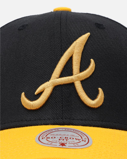 Mitchell & Ness Atlanta Braves "Enter The Dragon" Pro Crown Snapback Black/Ochre
