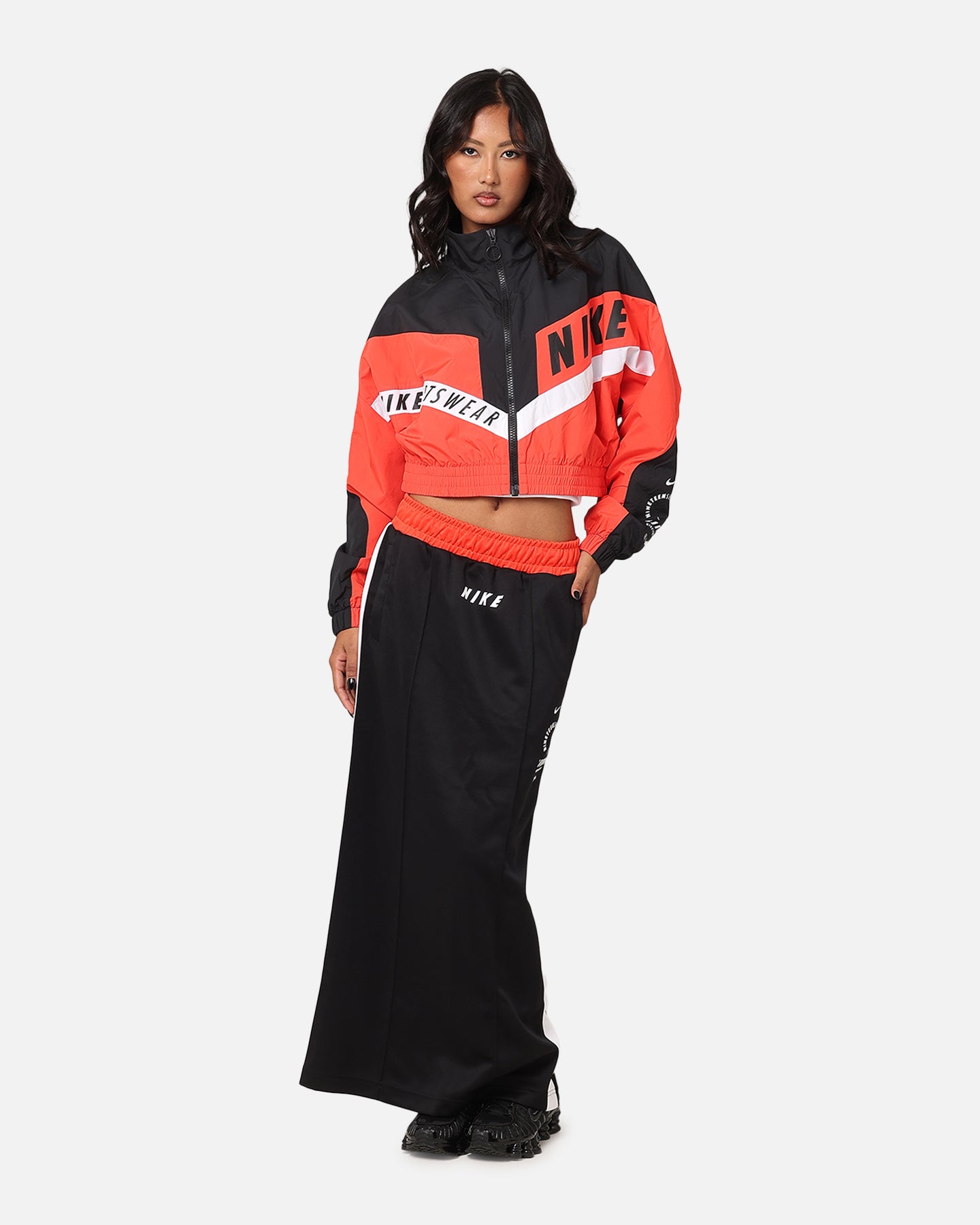 womens orange nike tracksuit