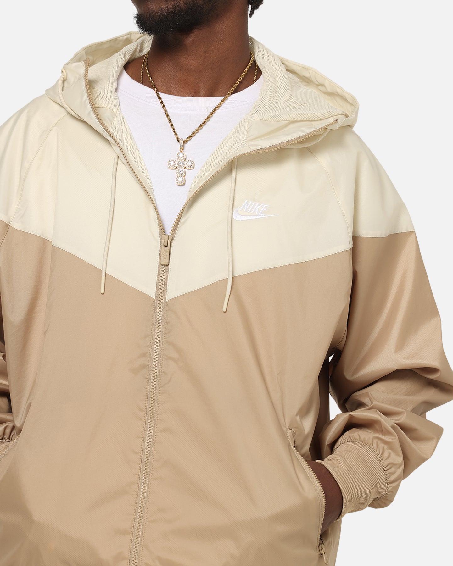 tan and white nike windbreaker