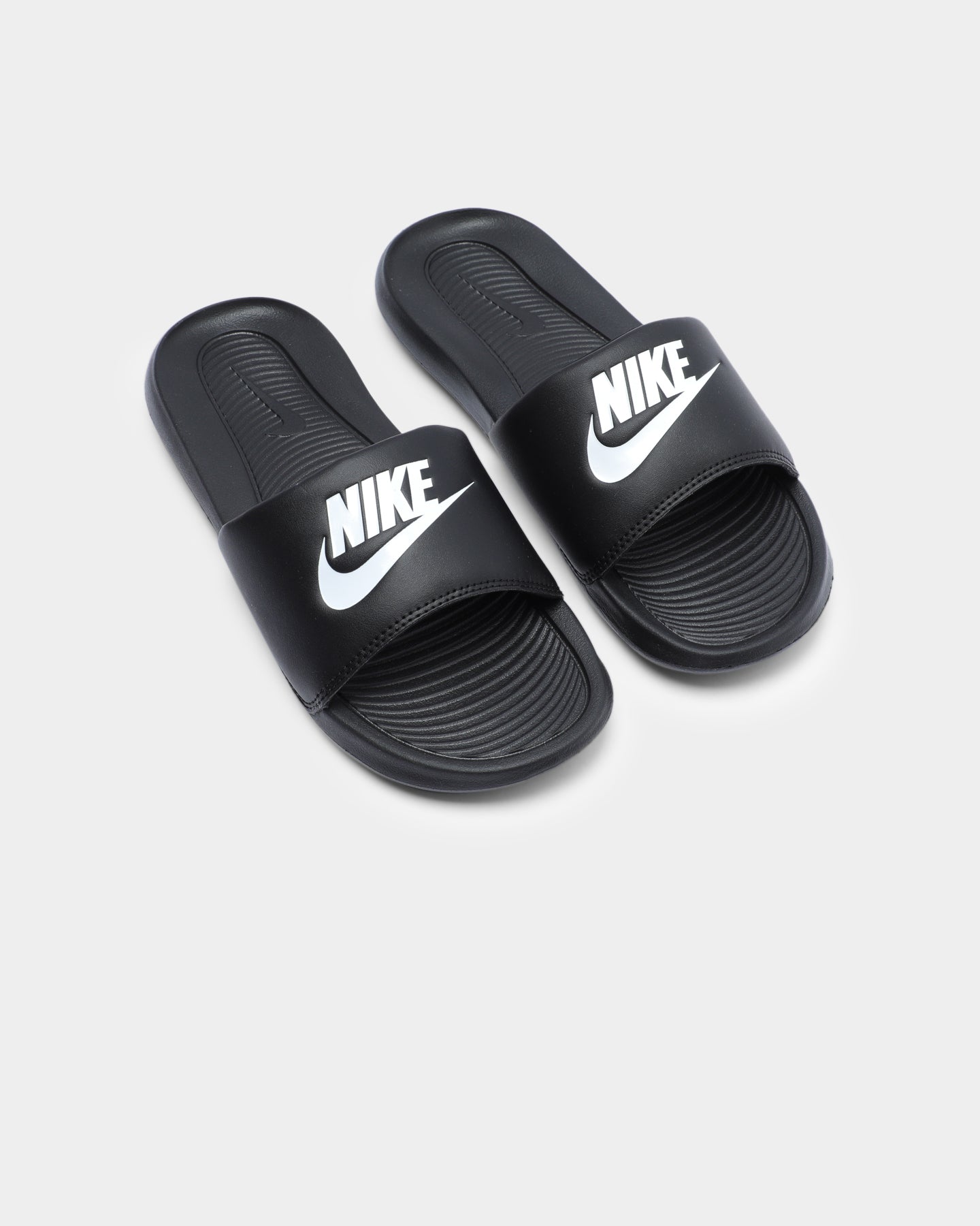nike women's victori one slide stores